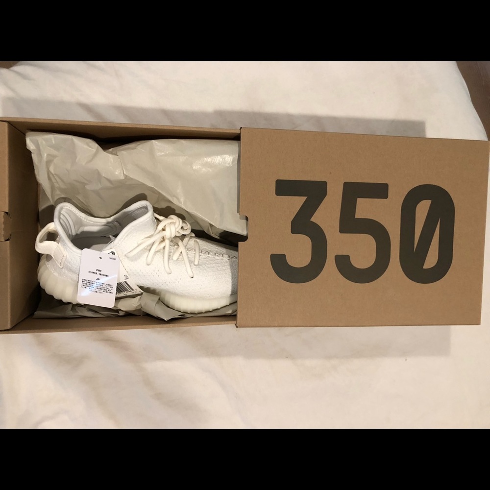 Brand new never worn yeezy triple white